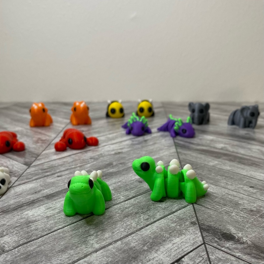 Wigglitz Mini Flexi Baby Stegosaurus by Zou3D 3D Printed Articulating Fidget Toy